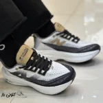 کتونی زنانه رانینگ زیره بوست نیوبالانس سفید مشکی