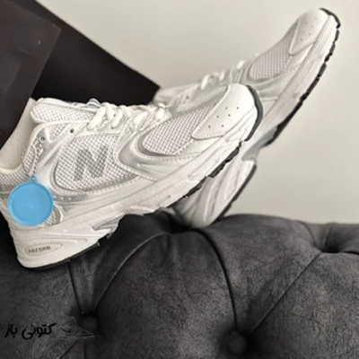 کتونی زنانه نیوبالانس سفید نقره ای