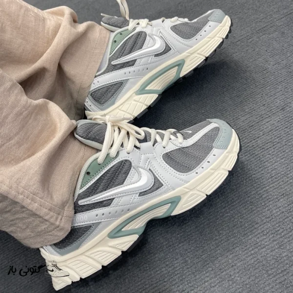 کتونی خارجی مردانه نایک مدل p7000 طوسی کرم Nike p7000 model grey cream