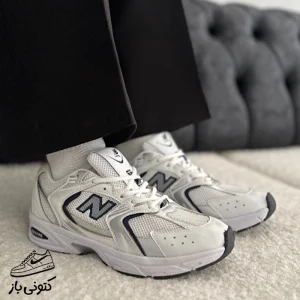 کتونی زنانه نیوبالانس سفید سرمه ای